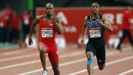 Powell aprovechó la ausencia de Bolt para triunfar en los 100 metros de París