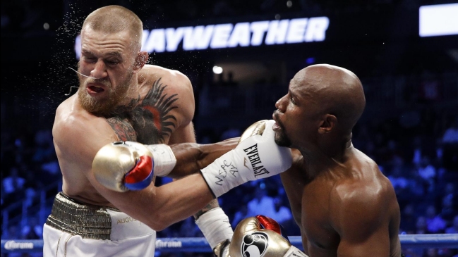 Conor McGregor negocia una revancha con Floyd Mayweather