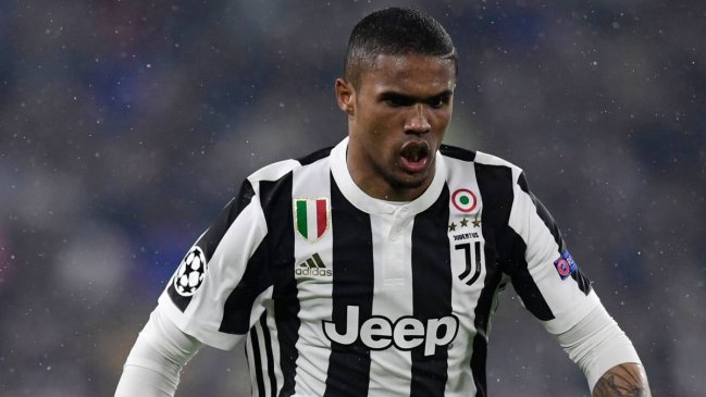 Douglas Costa se lesionó y es duda en Juventus para octavos de la Liga de Campeones